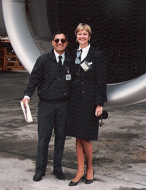 1991,  October, Lead Mechanic & Judy Skartvedt pose for a photo in front of a Pan Am Airbus A310 on the ramp of the airport in Rome, Italy.